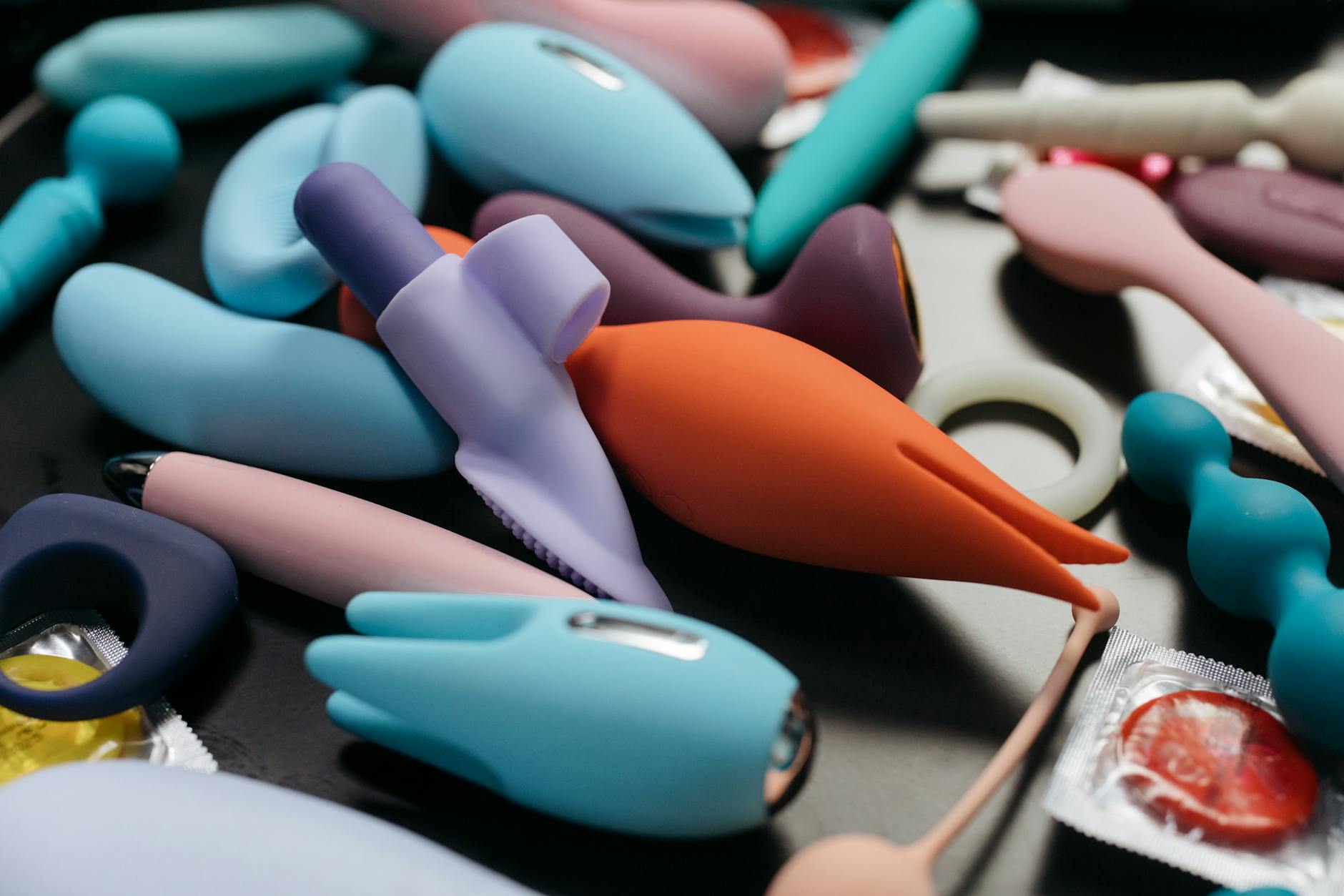 An array of vibrant lemon vibrators and adult toys displayed in close-up.